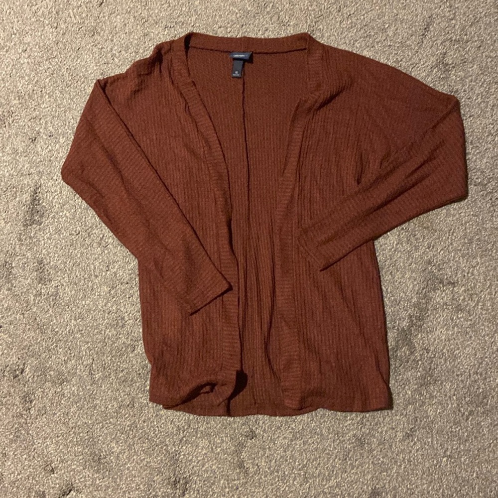 Mid length cardigan.